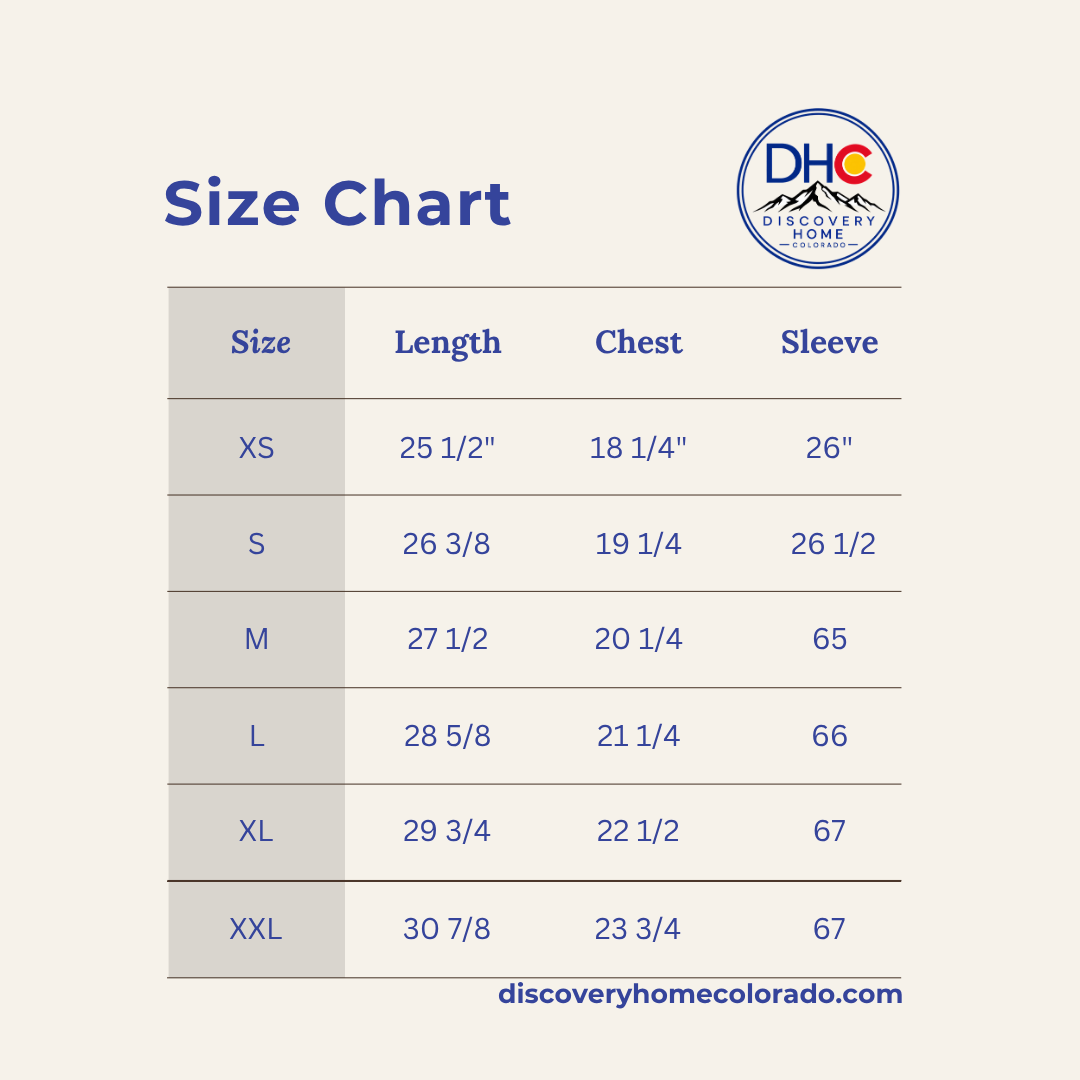 A size chart table for Discovery Home Colorado, showing sizes XS through XXL with measurements for length, chest, and sleeve on a light beige background.