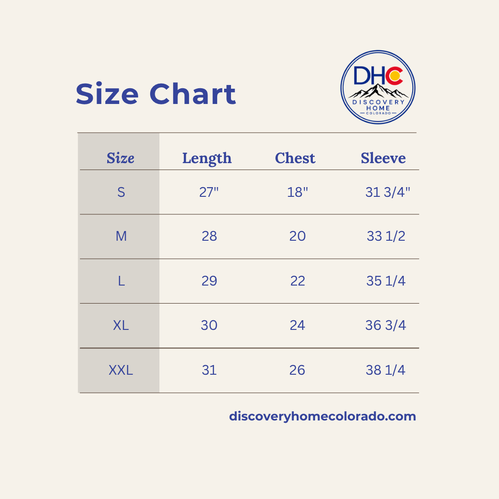 A size chart graphic for Discovery Home Colorado, showing a table with sizes S through XXL, length, chest, and sleeve measurements on a light beige background with blue text.