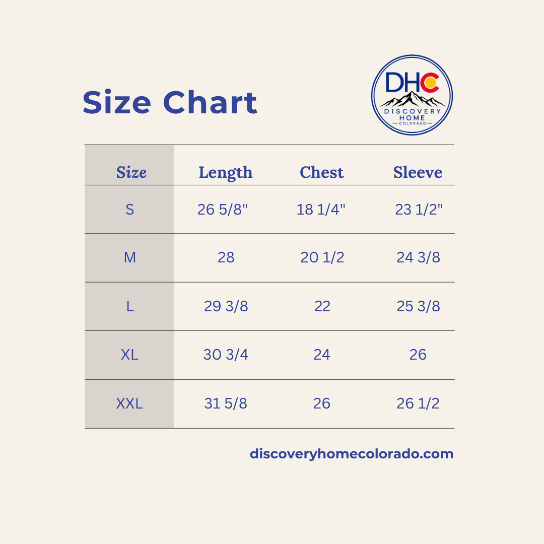 A size chart graphic for Discovery Home Colorado, showing a table with sizes S through XXL, length, chest, and sleeve measurements on a light beige background with blue text.
