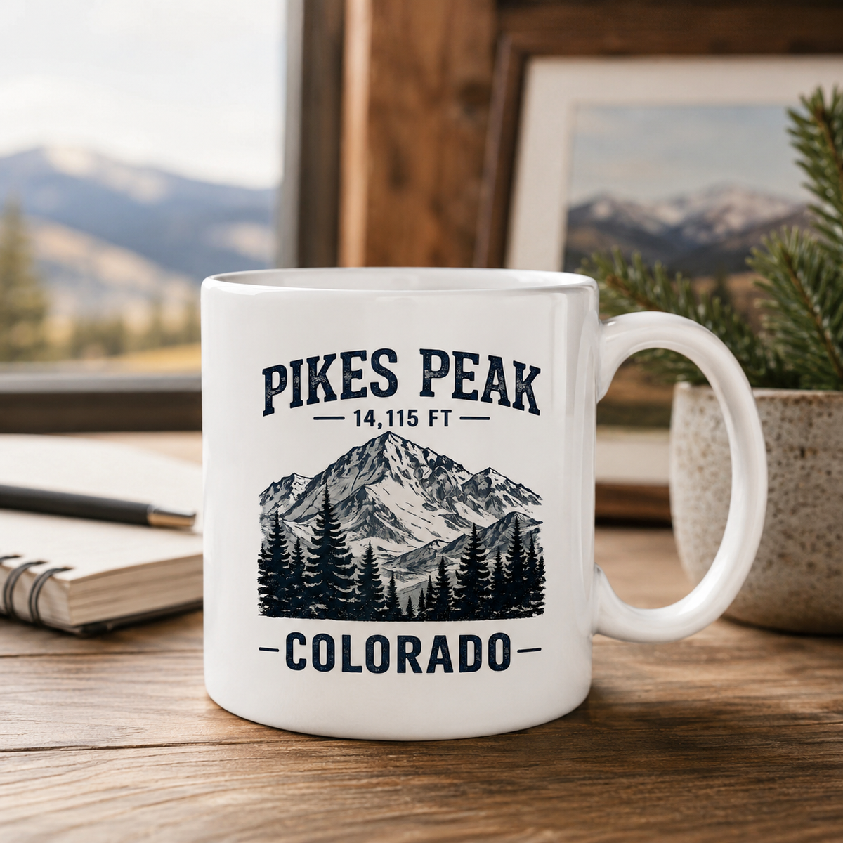 White 15 ounce ceramic Pikes Peak Colorado mug with mountain illustration
