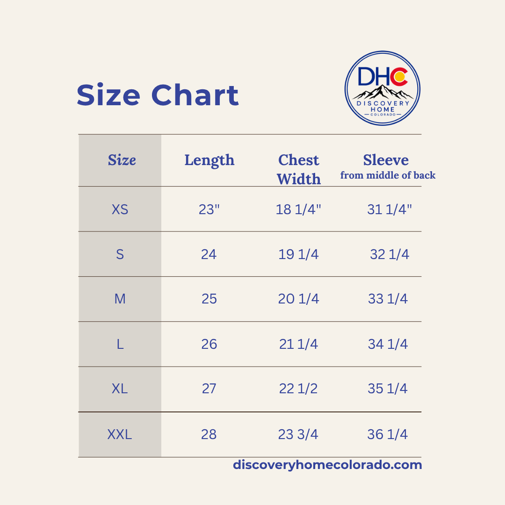 A size chart graphic for Discovery Home Colorador, showing measurements for sizes XS through XXL in a table with columns for Length, Chest Width, and Sleeve from middle of back, on a light beige background.