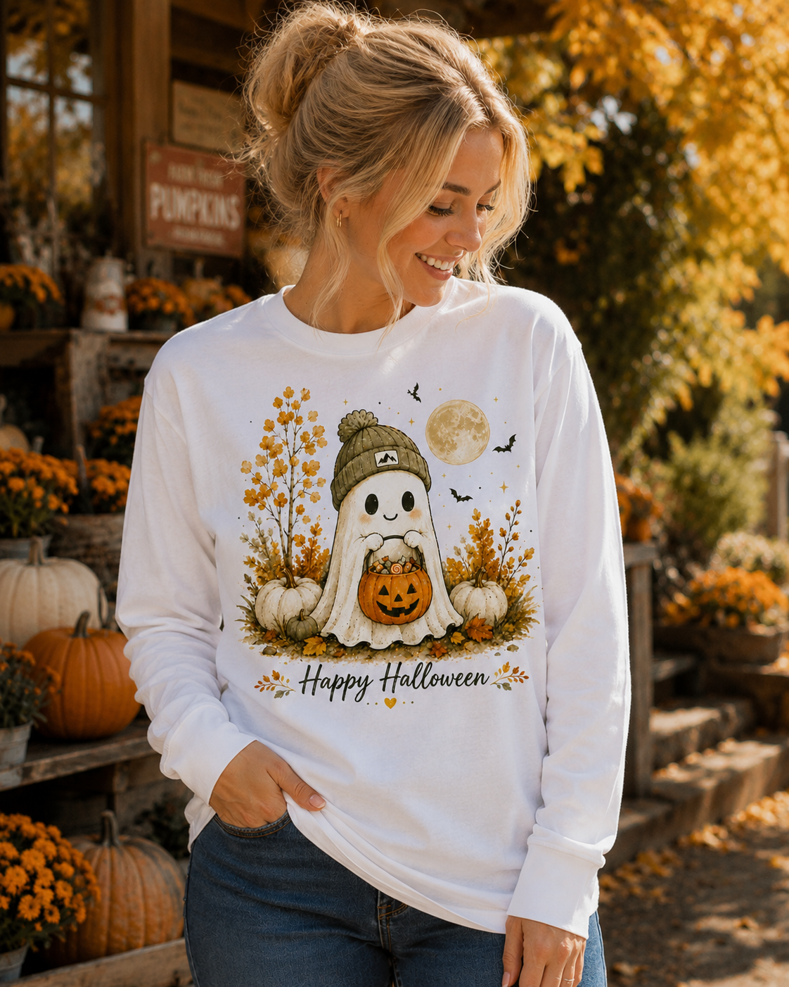 Woman wearing Happy Halloween Ghost long sleeve tee at a fall pumpkin market